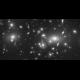 Hubble Views Distant Galaxies through a Cosmic Lens